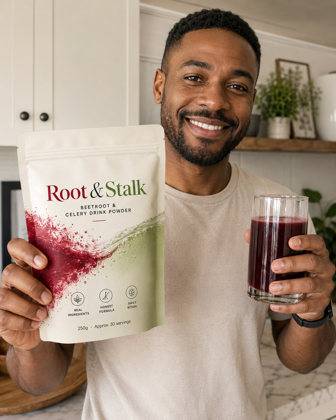 Person holding Root & Stalk pouch and a glass of dark red drink